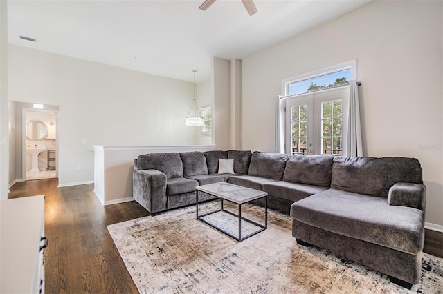 501 Knights Run Ave Unit 6104, Tampa, FL 33602 - living area with wood finished floors, a ceiling fan, and baseboards