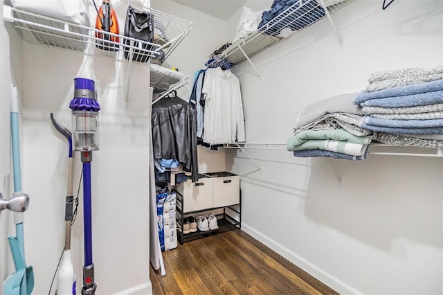 501 Knights Run Ave Unit 6104, Tampa, FL 33602 - walk in closet featuring wood finished floors