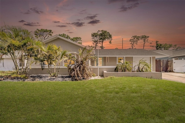 8433 101st Ave, Seminole, FL 33777 - view of front of house with concrete driveway, an attached garage, and stucco siding