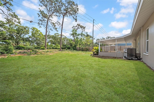 8433 101st Ave, Seminole, FL 33777 - view of yard featuring central AC