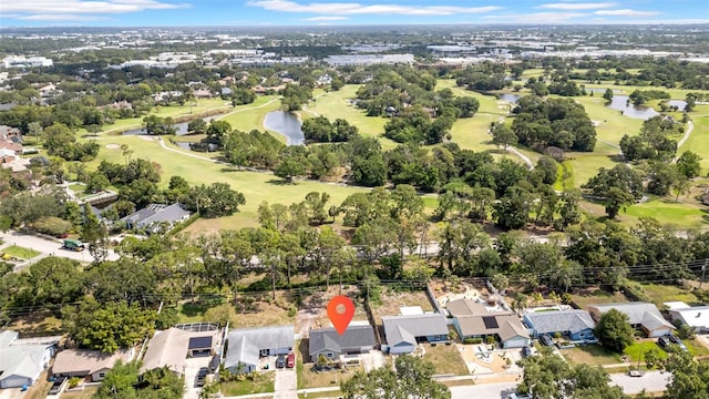 8433 101st Ave, Seminole, FL 33777 - view of property location with a local golf course, a nearby body of water, and nearby suburban area
