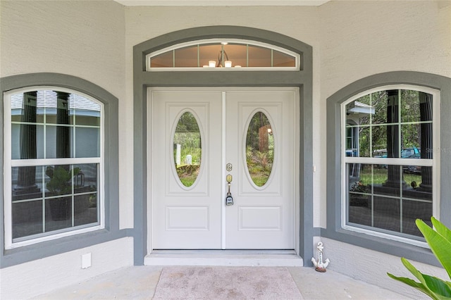 5032 N Crossgate Pt, Beverly Hills, FL 34465 - doorway to property featuring stucco siding