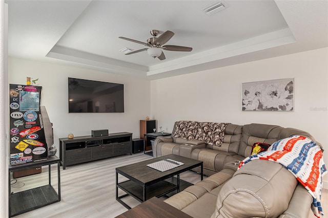 5032 N Crossgate Pt, Beverly Hills, FL 34465 - living area with a raised ceiling, ceiling fan, and light wood finished floors