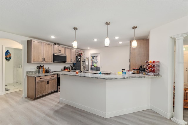 5032 N Crossgate Pt, Beverly Hills, FL 34465 - kitchen featuring stainless steel appliances, light wood-style floors, light stone counters, recessed lighting, and decorative light fixtures