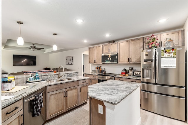 5032 N Crossgate Pt, Beverly Hills, FL 34465 - kitchen featuring stainless steel appliances, a sink, decorative light fixtures, light stone counters, and ceiling fan