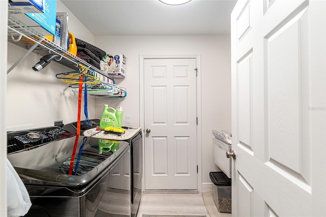 5032 N Crossgate Pt, Beverly Hills, FL 34465 - laundry room featuring separate washer and dryer and light wood-style floors