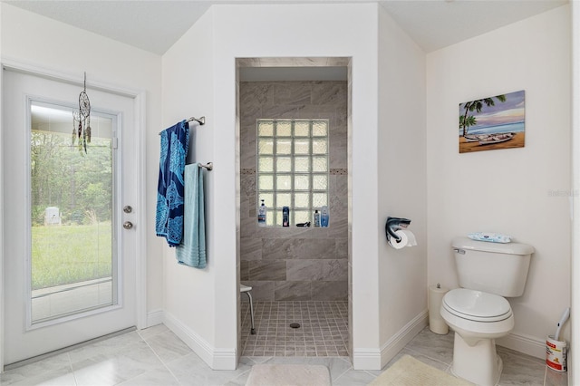 5032 N Crossgate Pt, Beverly Hills, FL 34465 - full bathroom featuring tiled shower, baseboards, toilet, and marble finish floors