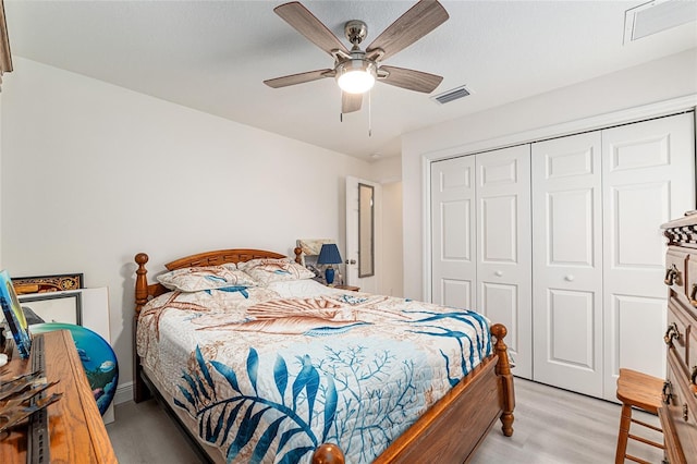 5032 N Crossgate Pt, Beverly Hills, FL 34465 - bedroom featuring a closet, light wood finished floors, and ceiling fan