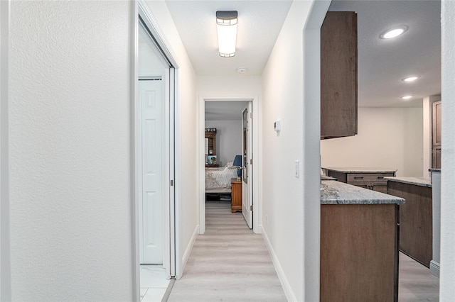 5032 N Crossgate Pt, Beverly Hills, FL 34465 - hall featuring light wood-type flooring, recessed lighting, and baseboards