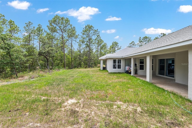 5032 N Crossgate Pt, Beverly Hills, FL 34465 - view of yard featuring a patio
