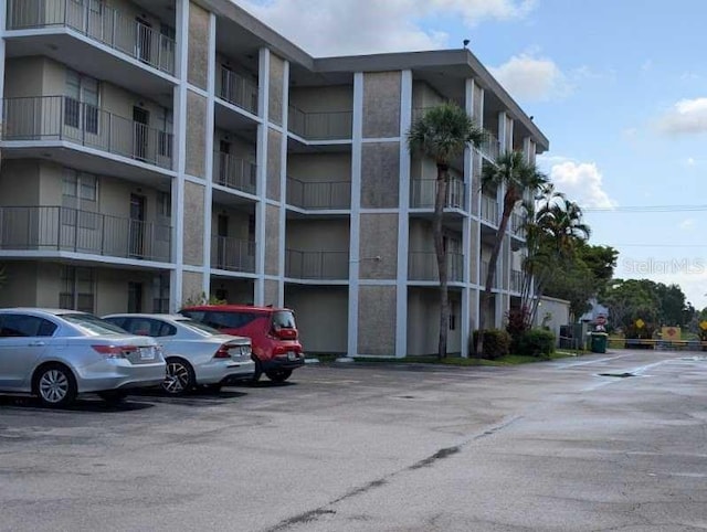2901 NW 48th Ave Unit 367, Lauderdale Lakes, FL 33313 - view of apartment building / complex featuring uncovered parking