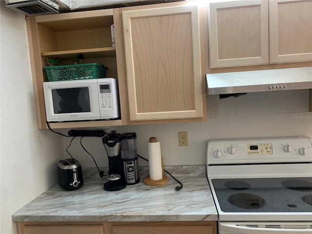 2901 NW 48th Ave Unit 367, Lauderdale Lakes, FL 33313 - kitchen with white appliances, wall chimney range hood, light brown cabinetry, light stone countertops, and open shelves