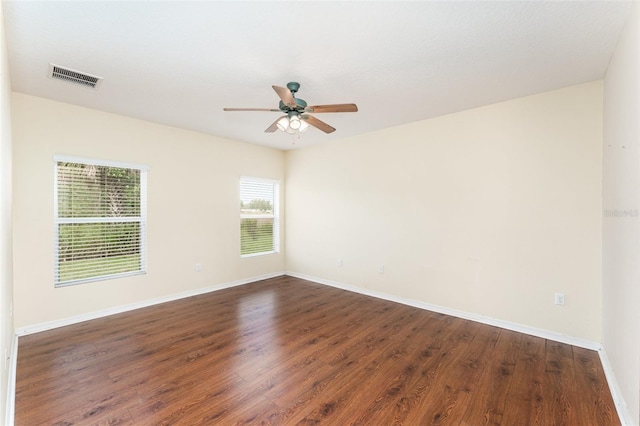 6898 Glenbrook Dr, Lakeland, FL 33811 - empty room with ceiling fan, baseboards, and dark wood-type flooring