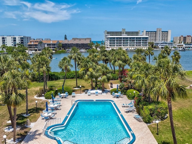 10216 Regal Dr Unit 409, Largo, FL 33774 - community pool with a patio area and a water view