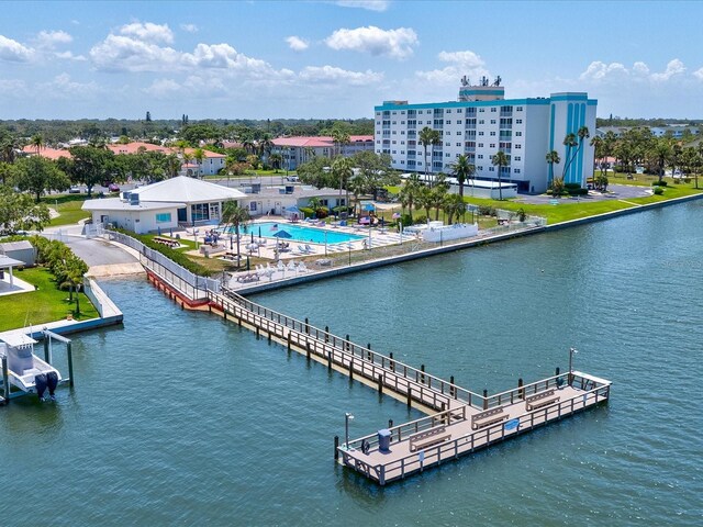 10216 Regal Dr Unit 409, Largo, FL 33774 - drone / aerial view of a nearby body of water and a pool area