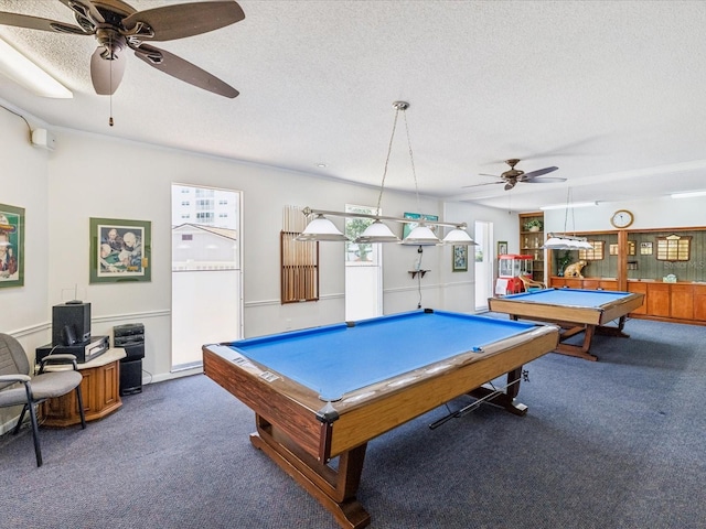 10216 Regal Dr Unit 409, Largo, FL 33774 - rec room featuring carpet floors, pool table, ceiling fan, and a textured ceiling
