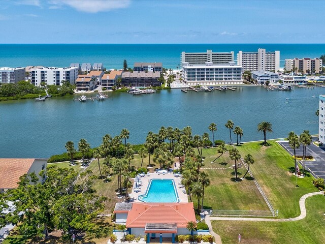 10216 Regal Dr Unit 409, Largo, FL 33774 - drone / aerial view of a large body of water and a pool area