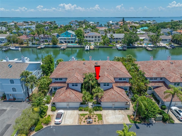 903 Pinellas Bayway S Unit 103, Tierra Verde, FL 33715 - aerial perspective of suburban area with a large body of water