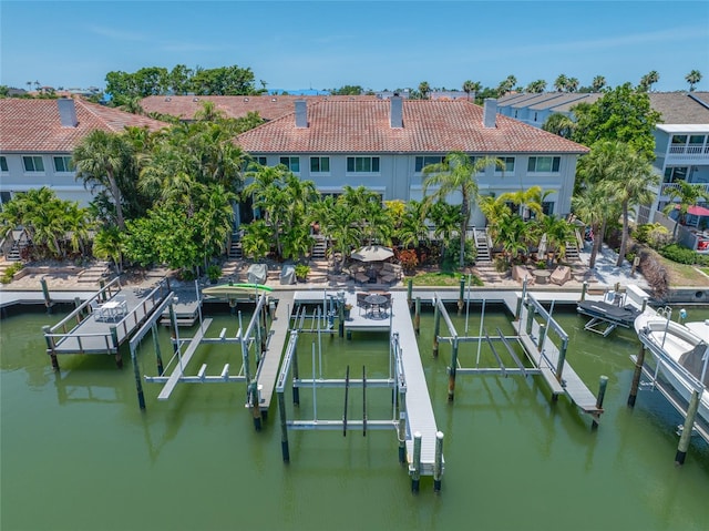 903 Pinellas Bayway S Unit 103, Tierra Verde, FL 33715 - dock area featuring boat lift and a water view