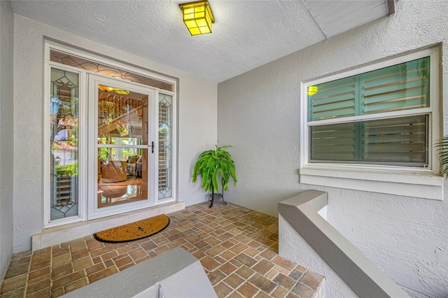 903 Pinellas Bayway S Unit 103, Tierra Verde, FL 33715 - property entrance featuring stucco siding