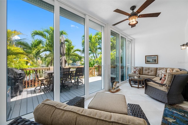 903 Pinellas Bayway S Unit 103, Tierra Verde, FL 33715 - sunroom / solarium with expansive windows and a wooden deck