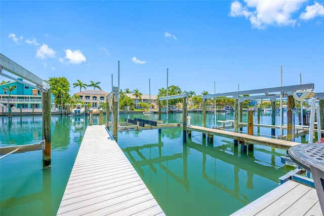 903 Pinellas Bayway S Unit 103, Tierra Verde, FL 33715 - dock area featuring a water view and boat lift