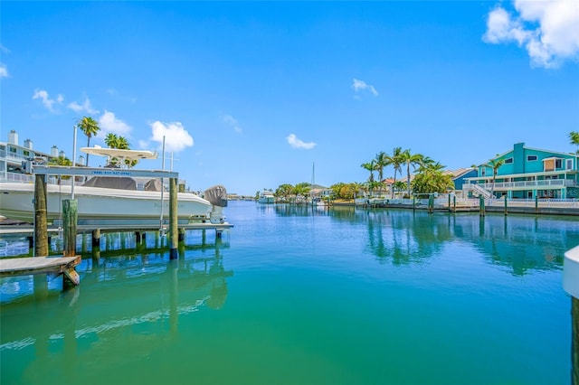 903 Pinellas Bayway S Unit 103, Tierra Verde, FL 33715 - dock area featuring boat lift and a water view