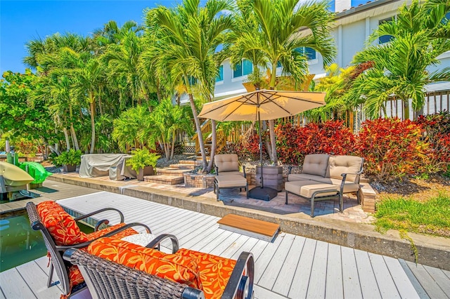 903 Pinellas Bayway S Unit 103, Tierra Verde, FL 33715 - wooden terrace featuring an outdoor hangout area and stairs