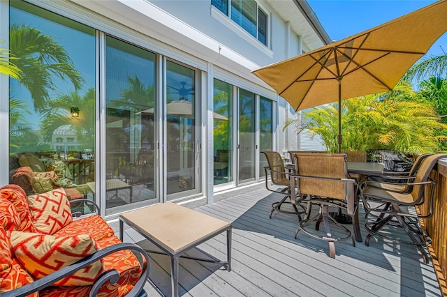 903 Pinellas Bayway S Unit 103, Tierra Verde, FL 33715 - deck featuring outdoor dining area