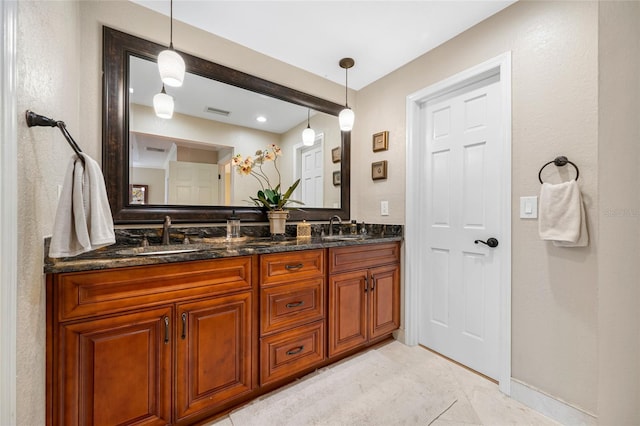 903 Pinellas Bayway S Unit 103, Tierra Verde, FL 33715 - bathroom with double vanity