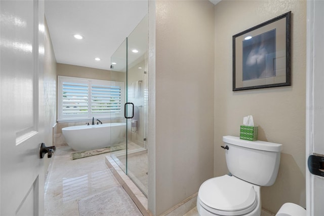 903 Pinellas Bayway S Unit 103, Tierra Verde, FL 33715 - full bath with a soaking tub, toilet, a shower stall, recessed lighting, and baseboards