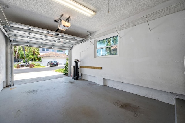 903 Pinellas Bayway S Unit 103, Tierra Verde, FL 33715 - garage featuring a garage door opener