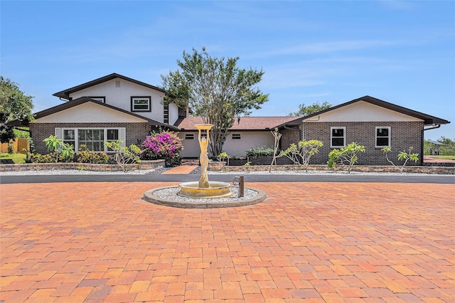 2309 Cypress Walk Way, Ruskin, FL 33570 - view of front of house featuring stucco siding and brick siding