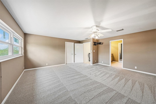 2309 Cypress Walk Way, Ruskin, FL 33570 - unfurnished bedroom featuring baseboards, light colored carpet, and ceiling fan