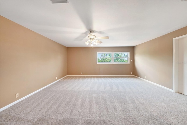 2309 Cypress Walk Way, Ruskin, FL 33570 - unfurnished room with a ceiling fan, baseboards, and light colored carpet