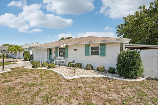 708 Rutgers Pl, Sun City Center, FL 33573 - single story home featuring a garage, brick siding, and driveway