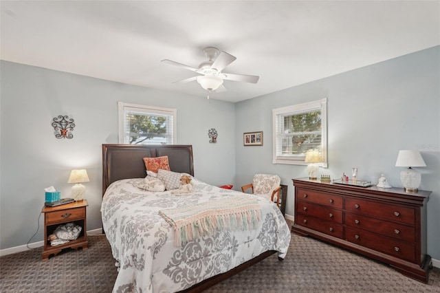 708 Rutgers Pl, Sun City Center, FL 33573 - carpeted bedroom featuring baseboards and ceiling fan