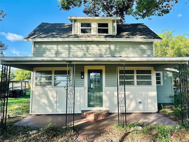 5654 12th St, Zephyrhills, FL 33542 - view of front of house with a porch