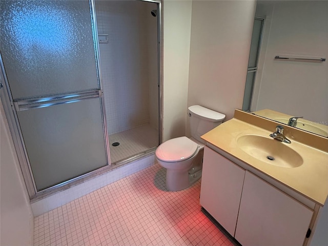 400 Island Way Unit 1402, Clearwater Beach, FL 33767 - bathroom featuring an enclosed shower, toilet, vanity, and tile patterned flooring