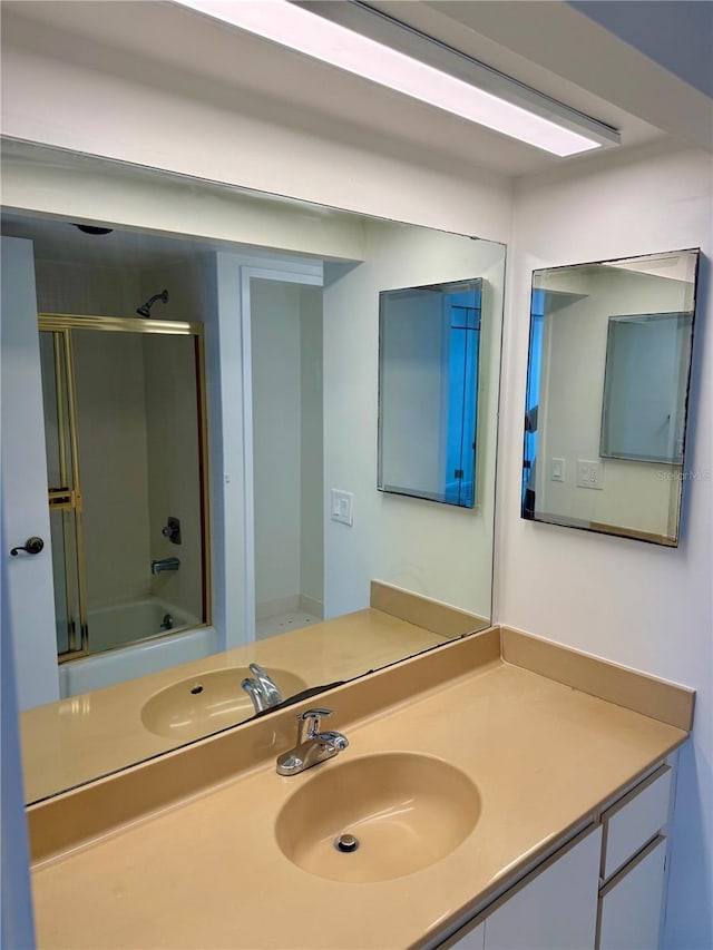 400 Island Way Unit 1402, Clearwater Beach, FL 33767 - bathroom with vanity and bath / shower combo with glass door