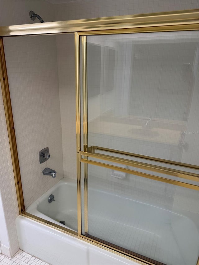 400 Island Way Unit 1402, Clearwater Beach, FL 33767 - full bath featuring bath / shower combo with glass door and tile patterned floors