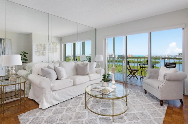 9000 Commodore Dr Unit 606, Seminole, FL 33776 - living area with a water view