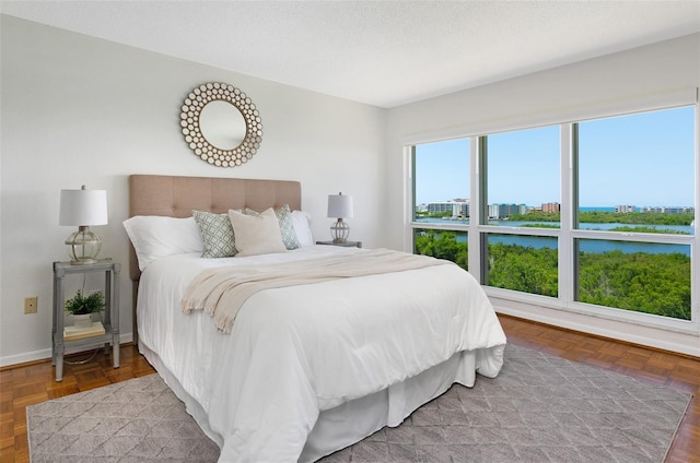 9000 Commodore Dr Unit 606, Seminole, FL 33776 - bedroom with a water view and a view of city