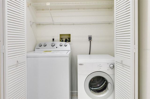 9000 Commodore Dr Unit 606, Seminole, FL 33776 - laundry room featuring washing machine and dryer