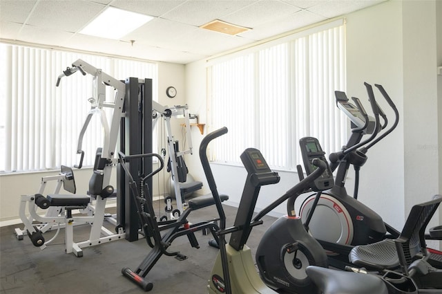 9000 Commodore Dr Unit 606, Seminole, FL 33776 - exercise room featuring a paneled ceiling and plenty of natural light