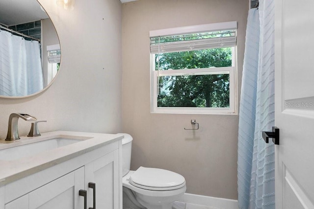 7208 N Ola Ave, Tampa, FL 33604 - full bath with vanity, toilet, and baseboards