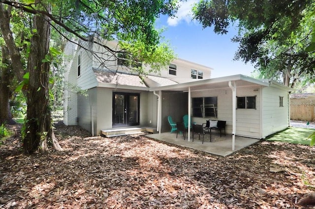 7208 N Ola Ave, Tampa, FL 33604 - rear view of property featuring a patio area