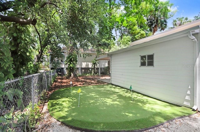 7208 N Ola Ave, Tampa, FL 33604 - view of yard featuring a putting green