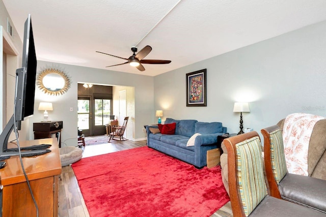 11201 122nd Ave Unit 167, Largo, FL 33778 - living area with wood finished floors and a ceiling fan