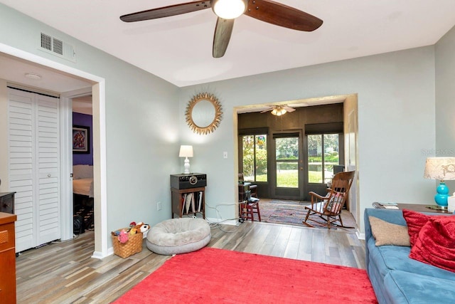 11201 122nd Ave Unit 167, Largo, FL 33778 - living room with a ceiling fan and wood finished floors